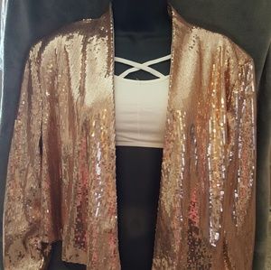 Short rose gold sequin jacket.